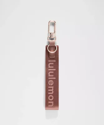 Lulu Lemon Never Lost Keychain Faint "Red Clay"
